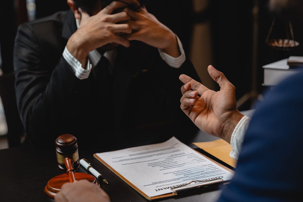 A lawyer discussing with a worried client