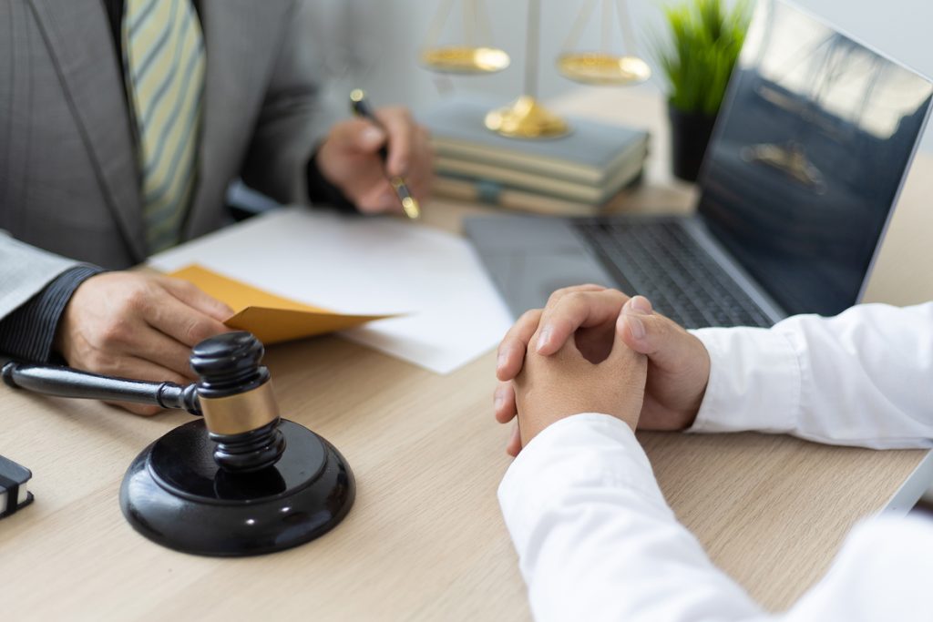 A lawyer providing legal consultation services to a client