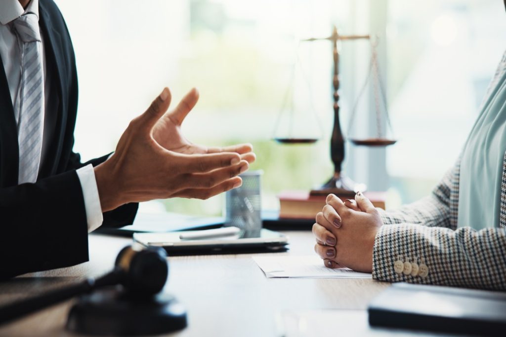 A lawyer consulting with a client